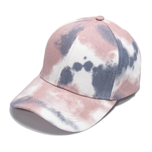 Detail view of pink and blue tie-dye baseball cap made from durable cotton canvas