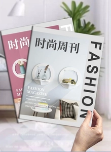 Detail view of modern minimalist decorative fashion magazines for wall shelf styling