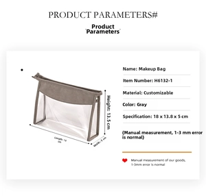 Detail view of grey portable travel toiletry bag with dimensions 18x13.8x5cm