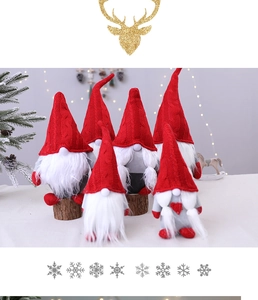 Detail of six Christmas gnomes with red knit hats on natural wood bases for holiday decor