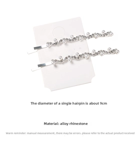 Detail of 9CM silver wavy hair clips featuring sparkling rhinestones and white pearls