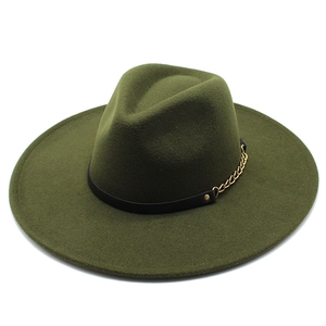 Close-up of olive green wide brim wool fedora hat with black leather band and gold chain