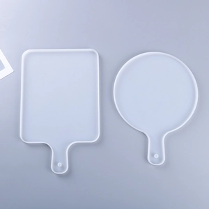 Macro view of rectangular and circular silicone resin molds with handle design