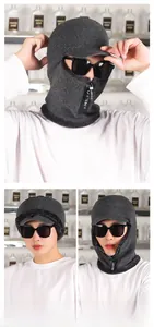 Detail of grey knitted balaclava with warm fleece lining and functional zipper closure