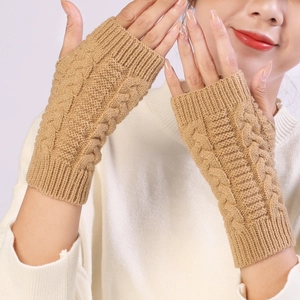 Detailed view of camel knit fingerless gloves with elegant cable stitch texture