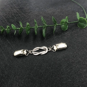 Vintage silver knot cardigan clip and sweater clasp with secure duckbill clips