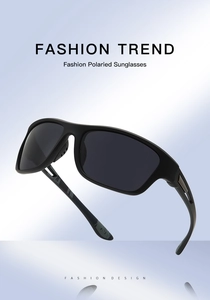 Detail view of matte black polarized cycling sunglasses with gray lenses and hollow temples