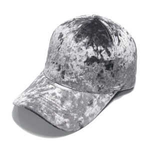 Detail of silver-grey velvet texture on a classic six-panel baseball cap with curved brim