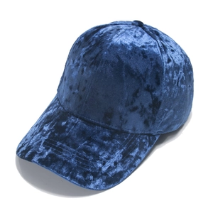 Fashionable dark blue crushed velvet baseball cap with warm autumn winter texture