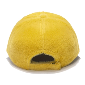 Rear view of yellow faux fur baseball cap showing plush texture and adjustable opening