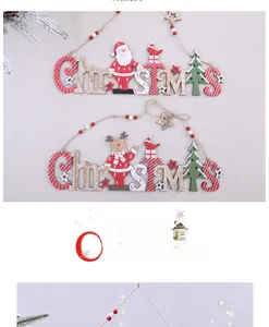 Close-up of wooden Christmas sign pendants with laser-cut reindeer and Santa motifs