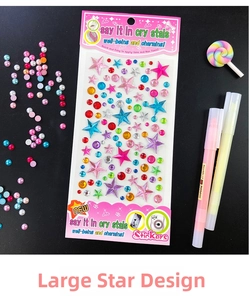 Detailed macro view of 3D crystal stickers in large star style with colorful rhinestones