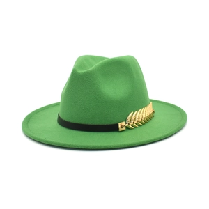 Close-up of emerald green wool fedora hat featuring black leather band and gold leaf charm