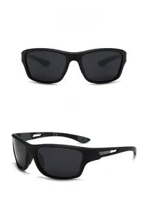 Close-up of matte black cycling sunglasses with silver hollow-out temple details