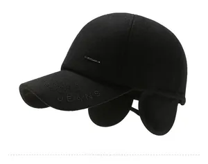 Side view of winter baseball cap with ear flaps and JEANS embroidery in black wool