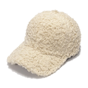 Winter faux lamb wool baseball cap in beige fluffy texture for a warm minimalist style