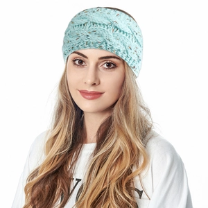 Detail of light blue chunky knit headband with colorful speckled yarn and cable pattern