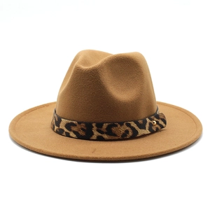 Close-up of a camel wool fedora hat featuring a leopard print band and golden stud detail