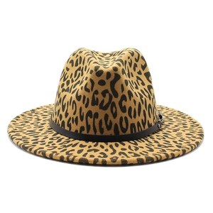 Close-up of leopard print fedora hat with black decorative band and metal buckle detail