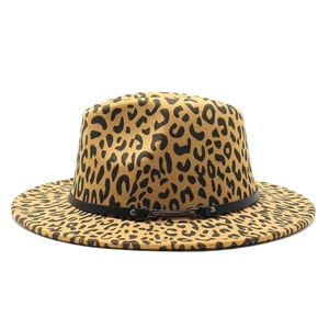 Detail of leopard print fedora hat featuring a black leather band with metal buckle