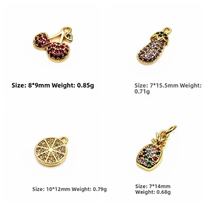 Detail view of fruit charms like cherry and pineapple with cubic zirconia and dimensions