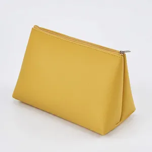 Neceser minimalista amarillo jengibre de cuero con patrón de lichi impermeable y cierre