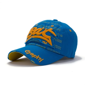 Detail of blue baseball cap showing 3D yellow BWC embroidery and distressed texture