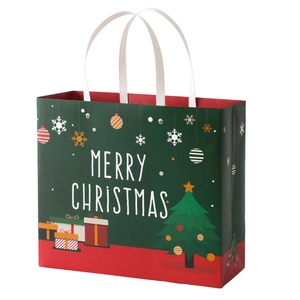 Bolsa de regalo de papel navideño con diseño verde festivo, ideal para regalos y manzanas.
