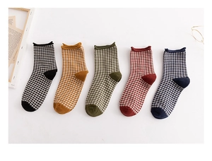 Detailed set of five vintage plaid cotton socks in black, yellow, green, red and navy