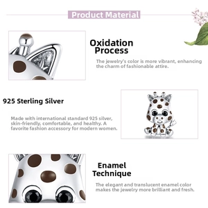 Detailed view of S925 sterling silver giraffe charm with brown enamel spots and oxidized finish