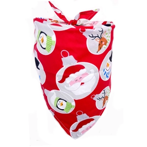 Detail of red cotton Christmas dog bandana with festive Santa and reindeer patterns