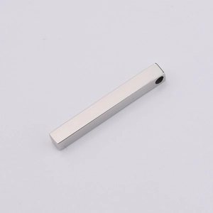 Detailed macro view of 5x40mm polished stainless steel rectangular bar pendant