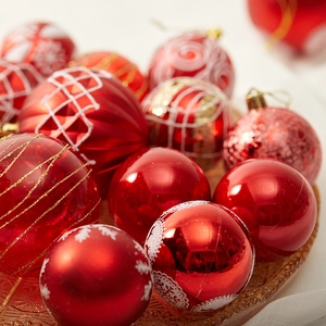 Red Christmas ball set with hand-painted snowflakes and matte metallic finishes