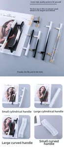 Detail view of cylindrical and curved resin drawer handles with silicone DIY molds