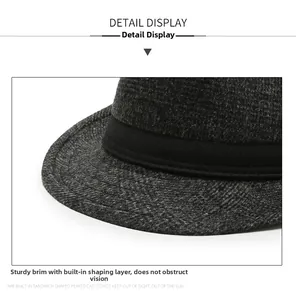 Detailansicht der stabilen breiten Krempe und des grauen Wollstoffs des britischen Fedora-Hutes