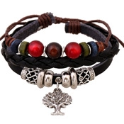 Detailed macro of multi-layer leather bracelet with tree of life charm and colorful beads