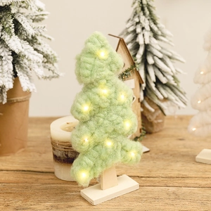 Green felt mini Christmas tree desk ornament with warm LED lights and wooden base