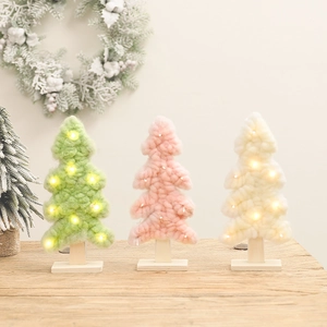Three felt Christmas tree tabletop decorations with warm LED lights and wooden bases