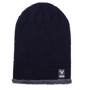 Thick navy blue knit beanie with gray fleece lining and V-shaped woven chevron patterns