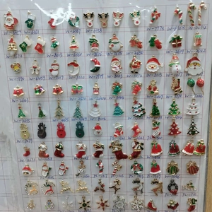 Macro view of Christmas holiday charms including Santa, snowmen and reindeer pendants