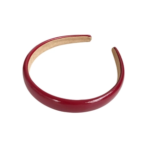 Classic red PU leather headband with glossy finish and beige inner lining for women