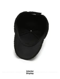 Interior view of warm black faux fur baseball cap showing lining and stitching details
