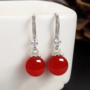Ethnic style silver earrings with red agate beads and sparkling cubic zirconia stones