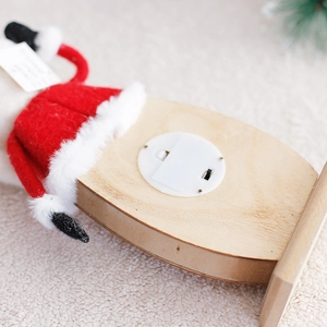 Nordic wooden Santa Claus figurine with glowing light and battery compartment base