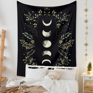 Bedroom wall decor showing moon phase tapestry with floral patterns in cozy interior