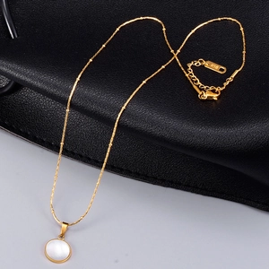 18K gold plated necklace with white shell pendant and fine beaded chain detail
