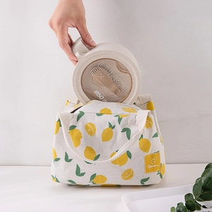 Insulated canvas lunch bag with lemon pattern and matching 850ml round lunch box