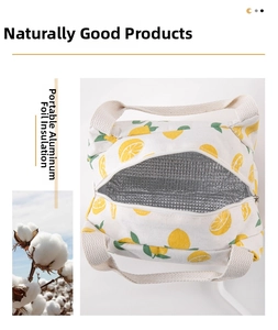 Detail view of thickened aluminum foil lining and lemon pattern on portable lunch bag