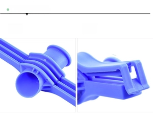 Detail view of the blue plastic bag sealer with precise gear and buckle locking mechanism