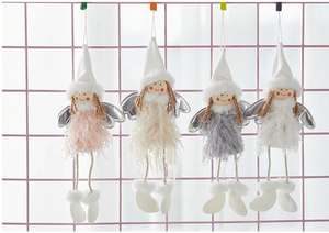 Four plush Christmas angel dolls with feather wings in pink, beige, grey, and white